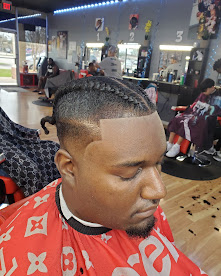 Sharp men's haircut with clean fade